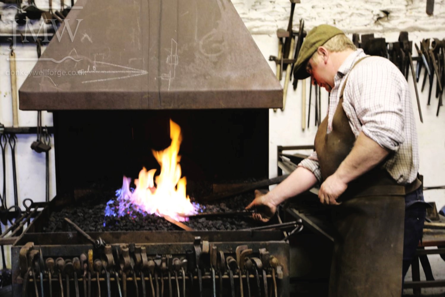 working-blacksmith-forge-ironwork-hammer-anvil-gloucestershire