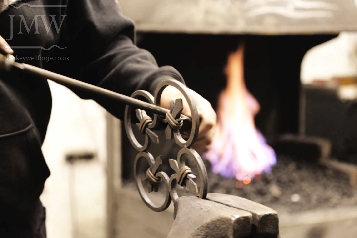 working-blacksmith-forge-gloucestershire-ironwork-filing-bespoke