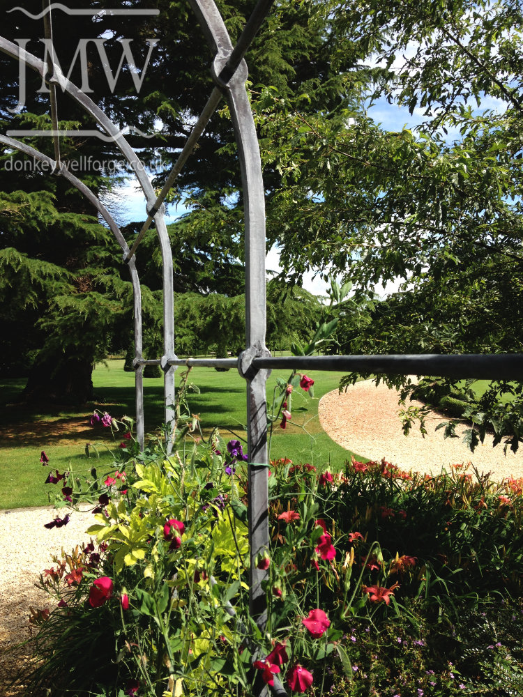 garden-arch-pergola-ironwork-architectual-cotswolds-donkeywell-forge-punched-bar