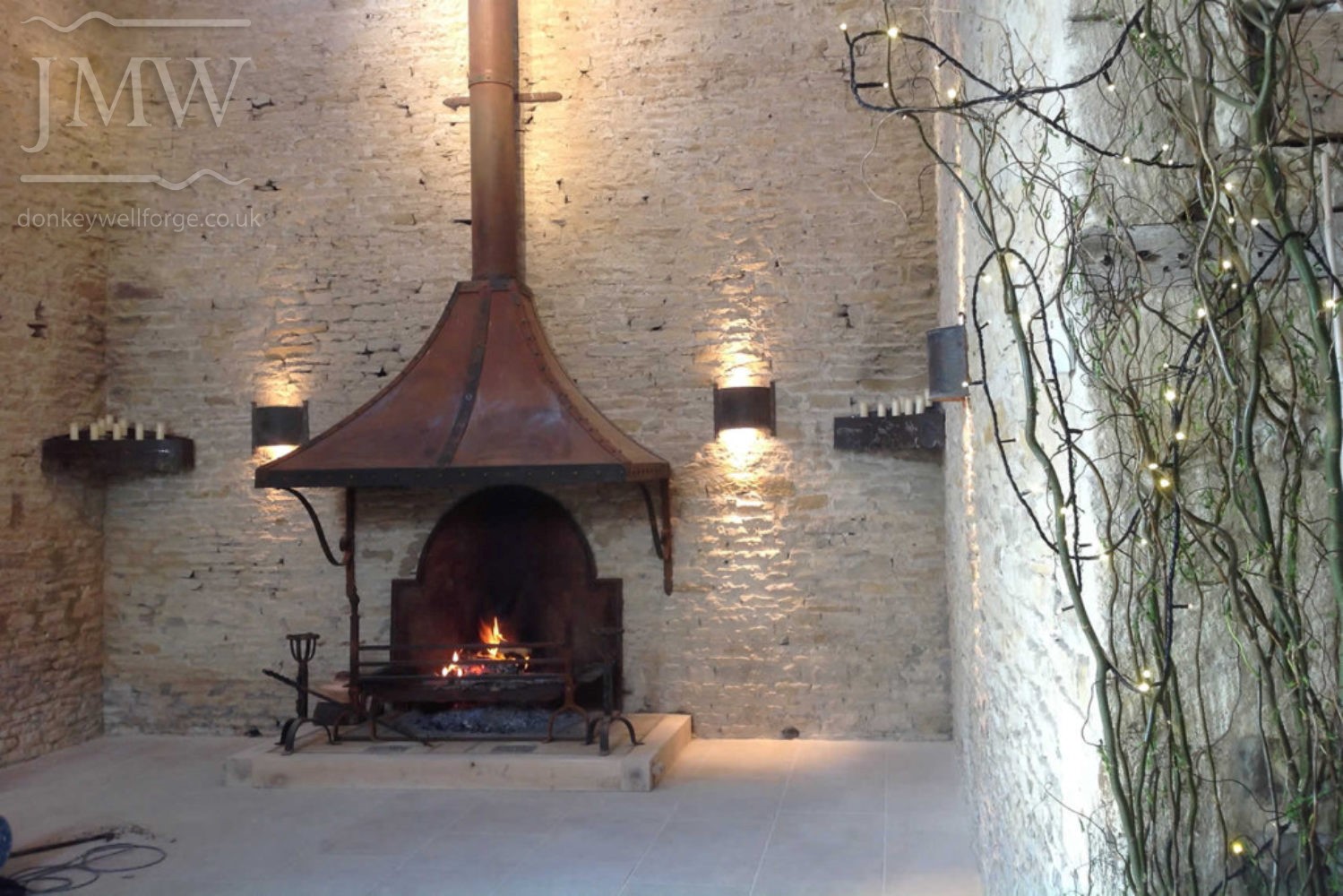 firehood-chimney-iron-wedding-venue-cotswolds-barn-donkeywell-forge-riveted