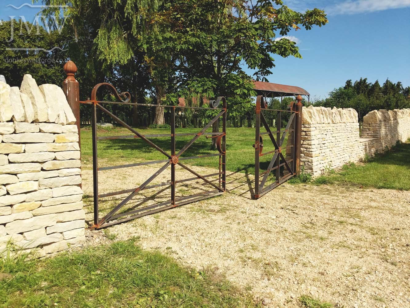 ornate-ironwork-country-house-gates-forged-scrolls