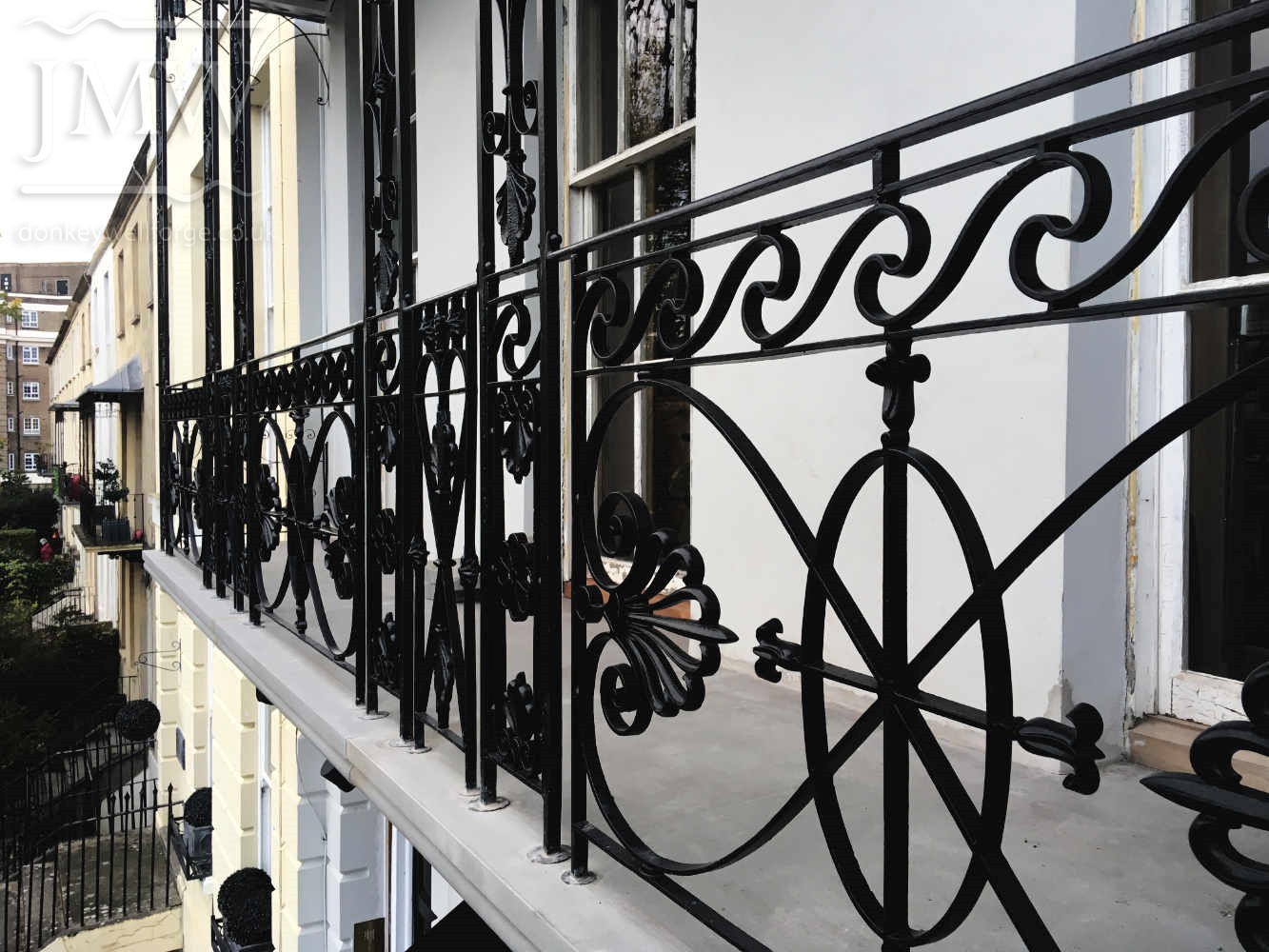 balcony-railings-iron-forge-blacksmith-cheltenham-restoration-donkeywell-forge-lead-castings