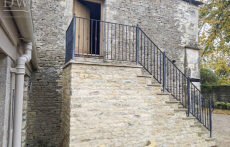 traditional-ornate-ironwork-lead-caulking-collars-tallet-stair-handrail