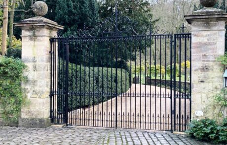 traditional-estate-ironwork-gates-handforged-scrolls-finials-railheads