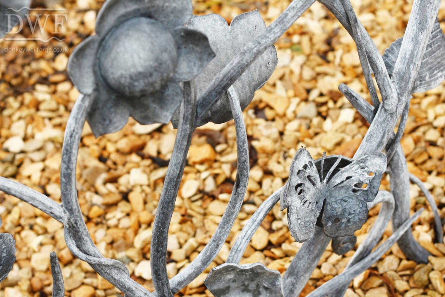 forged-artistic-floral-railings-gate-ironwork-patinated-donkeywell-forge-detail