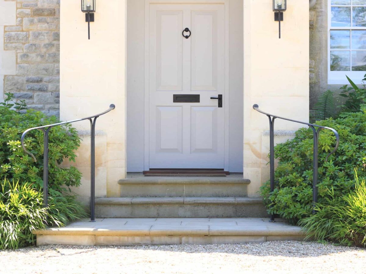 sweeping iron handrails made by traditional blacksmiths